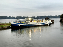 Vita Pugna barge in Italy at dusk