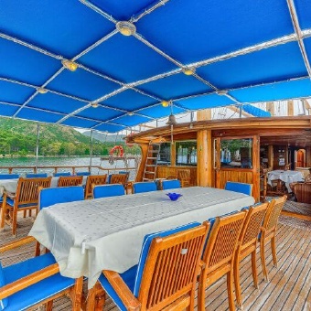 Thalassa covered deck on Greece bike and boat tour